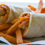 Bold Buffalo Chicken Wraps Paired with Crispy Sweet Potato Fries