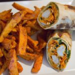 Spicy Buffalo Chicken Wraps Paired with Crispy Sweet Potato Fries