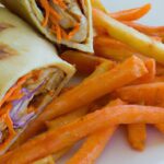 Spicy Buffalo Chicken Wraps Paired with Crispy Sweet Fries